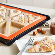 Silpat Reusable Silicone Baking Molds - Tartelette Mold, featuring 12 wells for perfectly shaped pastries, ideal for baking enthusiasts.