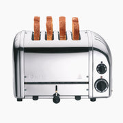 Dualit | 4 Slice Classic Toaster, Polished chrome, with four upright bread slices, two rotary controls for browning and defrost settings, and a front lever for easy use.