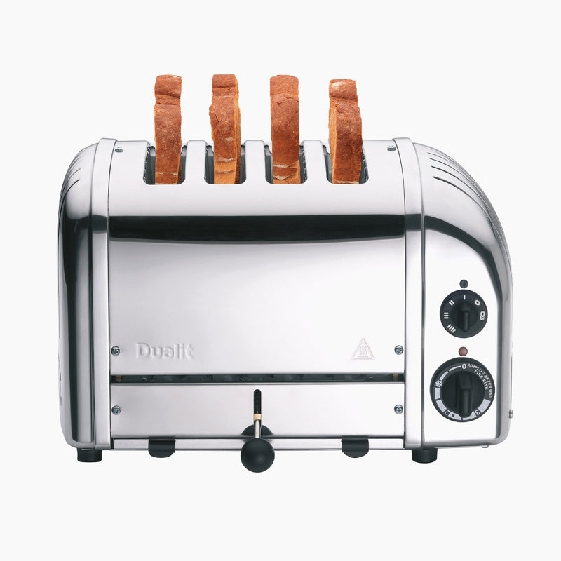 Dualit | 4 Slice Classic Toaster, Polished chrome, with four upright bread slices, two rotary controls for browning and defrost settings, and a front lever for easy use.