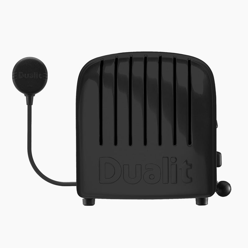 Dualit | 4 Slice Classic Toaster, Matt Black, features embossed logo, vertical slots, and detachable control pod, blending craftsmanship and smart functionality.