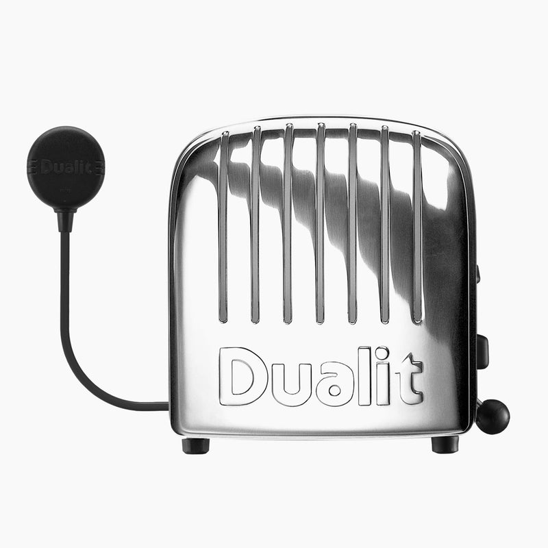 Dualit | 2 Slice Classic Toaster, Polished with a detachable wireless charging pad, showcasing durable design and innovative features for efficient toasting.