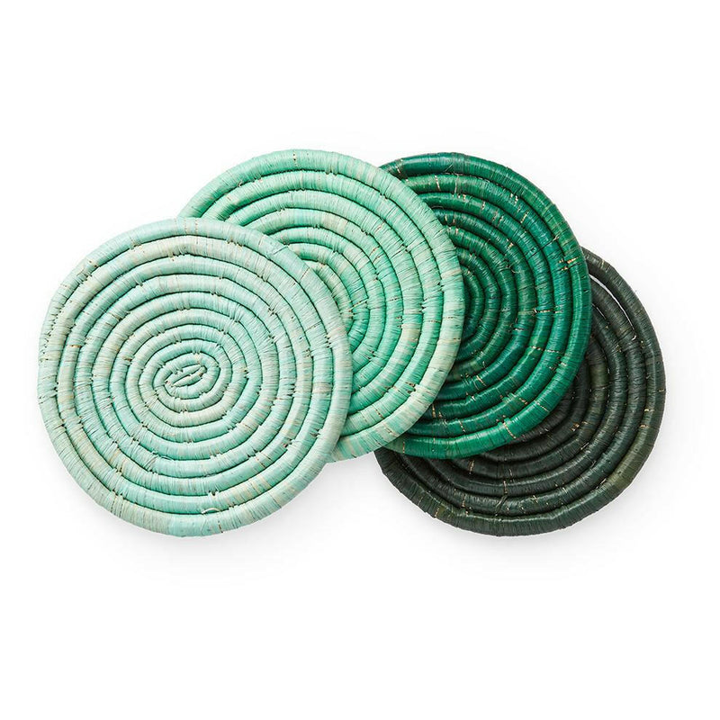 St. Frank | Ombré Coaster Collection - Blue: Set of four handmade green and black woven coasters, showcasing traditional craftsmanship with natural fibers, tied with a black grosgrain ribbon.