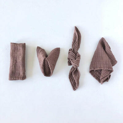 Close-up of borrowed BLU | Organic Cotton Napkins Set of 6 - Mixed Pastel, showcasing their soft texture and folded presentation, ideal for enhancing any dining setting.