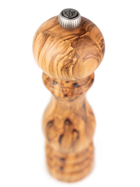 Peugeot | Paris Classic Olive Pepper Mill, Olive Wood, 9 inches: a turned-wood spice grinder with an adjustable metal knob, showcasing olive wood's natural grain.