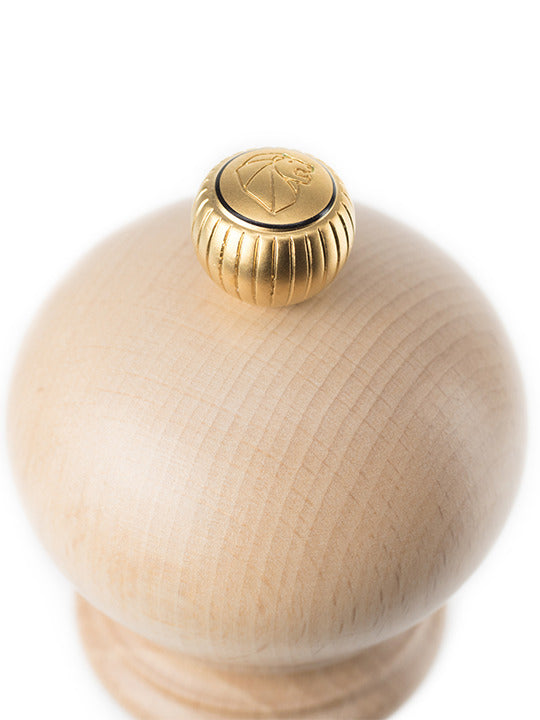 Peugeot | Paris u'Select Pepper Mill Natural Wood, 9 inches, featuring a curved wooden body and ribbed brass knob for adjustable grinding, epitomizes classic kitchen elegance.