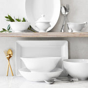 Pillivuyt | Shallow Pasta + Soup Bowls displayed on a shelf, showcasing their sleek, contemporary design suitable for serving soup, pasta, or salad.