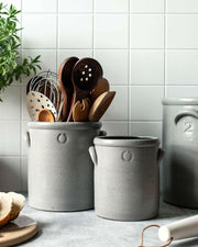 Farmhouse Pottery Agrarian Crocks, 1-2 Gallon Toast size, featuring an arched handle and hand-stamped volume, crafted with organic materials for a textured finish.