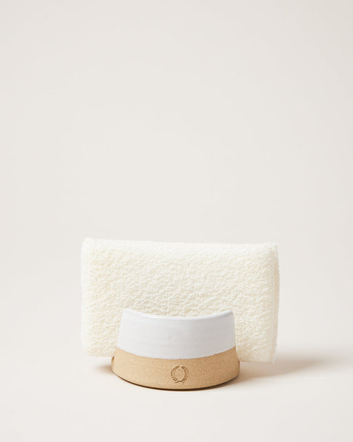 Farmhouse Pottery | Sponge Holder displayed with a folded hand-towel, highlighting its two-tone ceramic design, perfect for a stylish yet functional kitchen accessory.