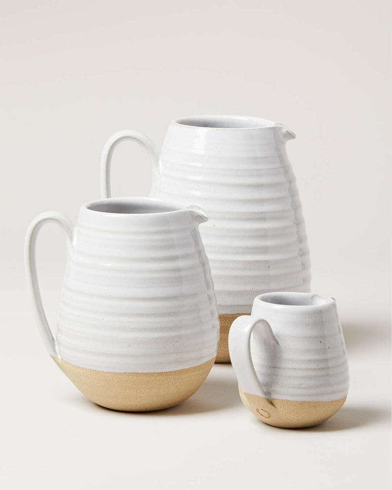 Farmhouse Pottery Farmer's Pitcher - Medium, featuring a hand-formed spout and sturdy handle, ideal for serving beverages or displaying flowers with rustic elegance.