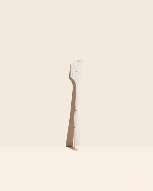 GIR | Skinny Spatula - Navy, featuring a white spatula design with sprinkle-like details, known for its antimicrobial unibody construction and exceptional performance.