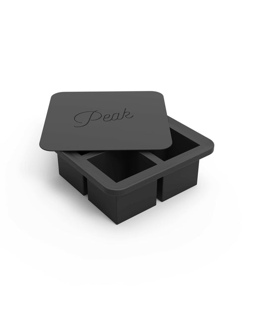 W&P | Peak Reusable Silicone Ice Trays - Charcoal: Creates 12 large ice cubes, with sturdy silicone-wrapped steel frame for easy filling and transport, ideal for drinks or food preservation.