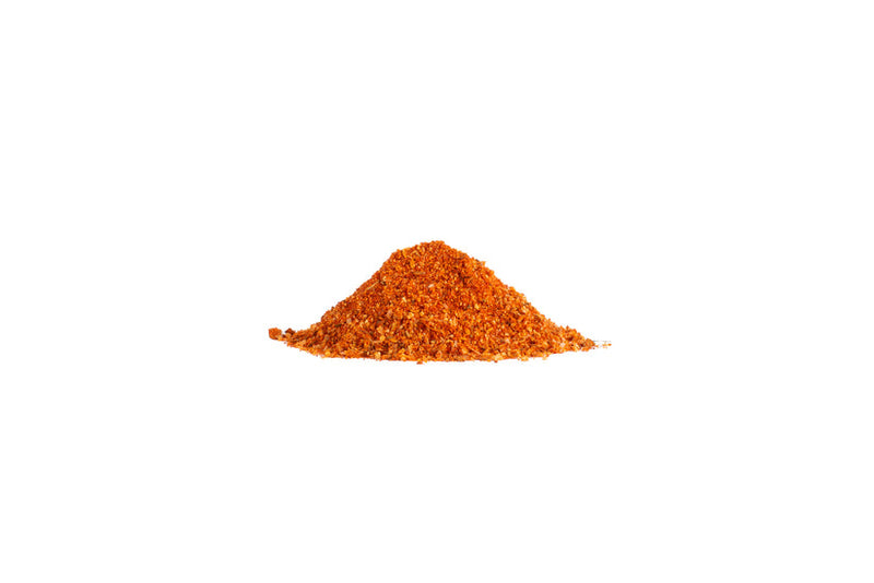 Spicewalla | Piri Piri: A coarsely ground reddish-orange spice blend featuring paprika and chili flakes, perfect for enhancing Portuguese dishes or roasted chicken.