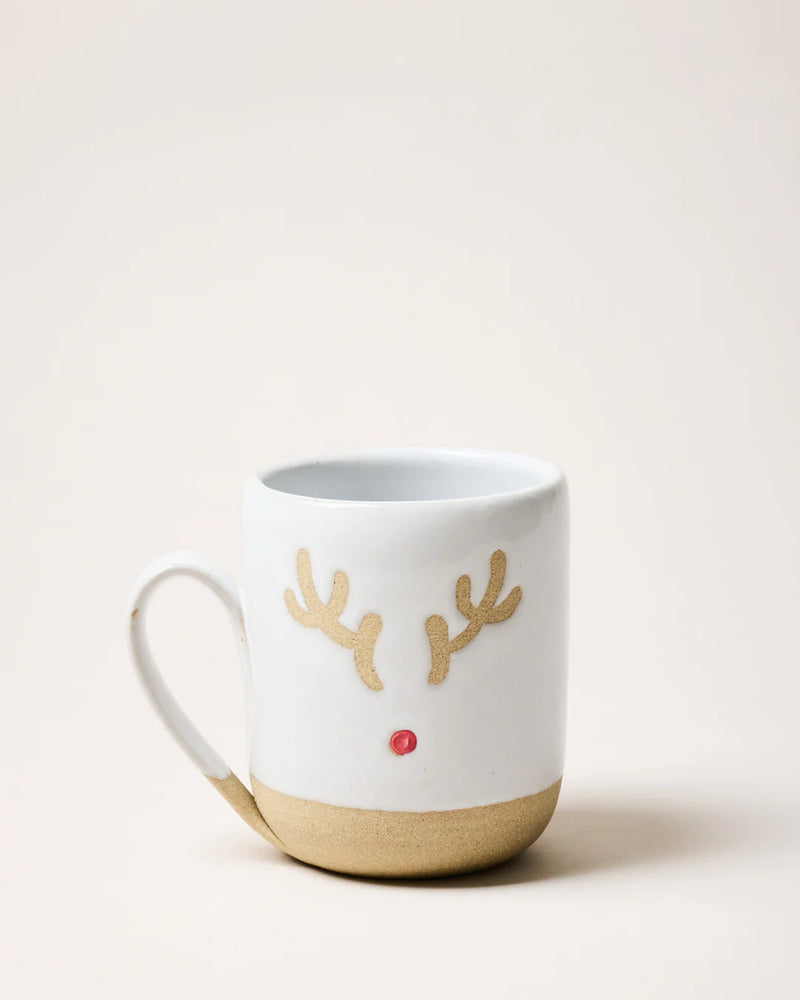 Farmhouse Pottery | Collector's Edition Rudolph Mug featuring a festive reindeer face with gold antlers and a red nose, perfect for holiday drinks and cozy evenings.