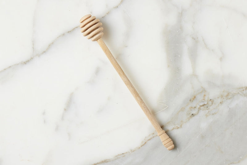 Etú HOME | Beechwood Bavarian Honey Dripper, a handcrafted wooden tool for effortless honey drizzling, ideal for enhancing tea and breakfast experiences.