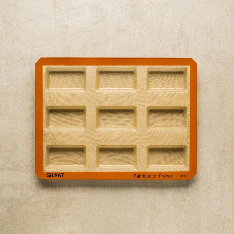 Silpat Reusable Silicone Baking Molds - Tartelette Mold with 12 holes for perfectly shaped pastries, ideal for baking enthusiasts seeking durable, non-stick bakeware from Athens Cooks.