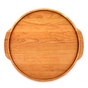 J.K. Adams | Cherry Round Wooden Serving Tray with shallow rim and side handles, ideal for serving or slicing, reflecting Athens Cooks’ curated kitchen essentials.