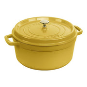 Staub 5.5 qt Citron Cocotte, perfect for slow-cooking, features a self-basting lid and matte black enamel interior, ideal for professional and home kitchens.
