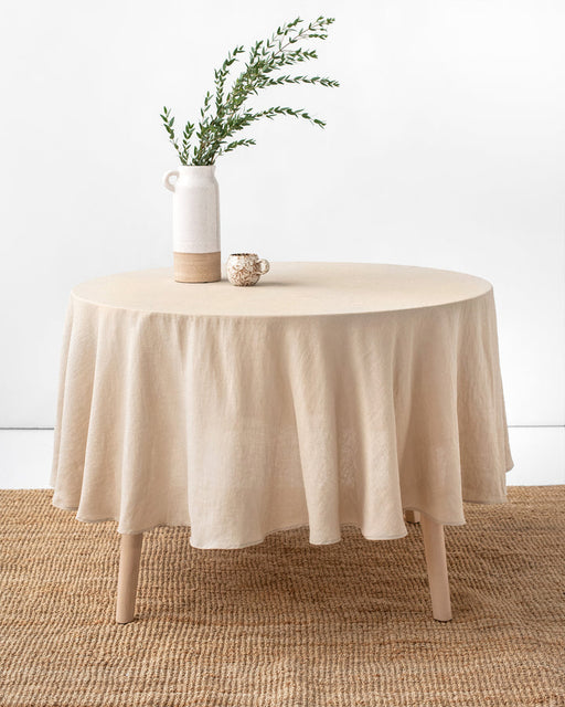 Round linen tablecloth, 79 inches, by MagicLinen, showcasing natural elegance, ideal for enhancing kitchen and dining spaces, aligning with Athens Cooks' curated kitchen collection.