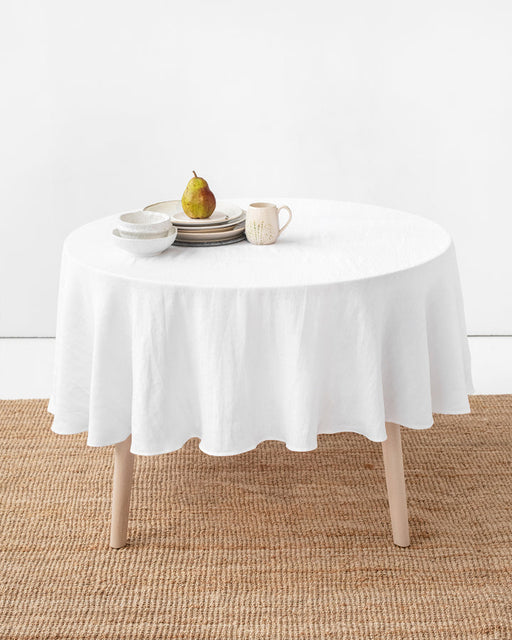 MagicLinen | Round Linen Tablecloth - White 79 Inches Round, ideal for versatile dining settings, with a contemporary seam, perfect for mixing with napkins and runners.