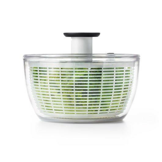 OXO Good Grips Salad Spinner with non-slip knob and built-in brake, doubles as colander for easy rinsing, ideal for drying greens in compact storage.
