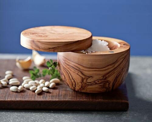 Bérard Olivewood Salt Keeper with open lid, showcasing its elegant, dense olive wood design, ideal for easy, one-handed use in any gourmet kitchen.