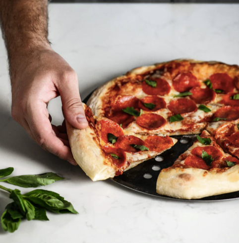 de Buyer | Blue Steel Pizza Tray - 16 in, features a perforated design for crispy crusts, durable blue steel, ideal for pizzas and tarts, perfect for home baking.