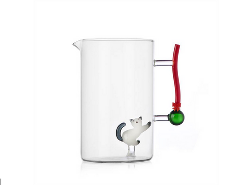 Ichendorf | Tabby Cat Jug: A clear glass pitcher featuring an internal glass kitten and decorative red handle, blending whimsy and function for holiday gatherings.