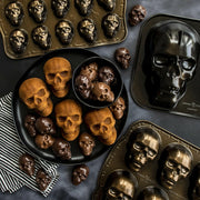 Nordic Ware | Skull Cakelet Pans - Skull Bites, featuring skull-shaped baking pans and treats for spooky-themed desserts, perfect for Halloween gatherings.