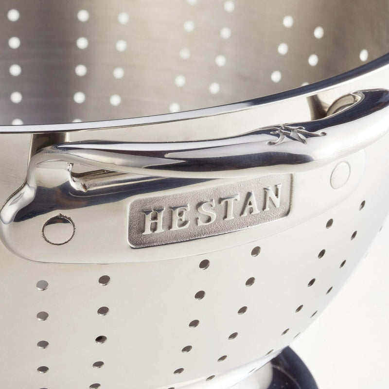 Hestan Provisions | Stainless Steel Colanders - 3 Quart: Polished stainless-steel colander with embossed handle, ergonomic grip, and drainage holes, ideal for effortless kitchen straining tasks.