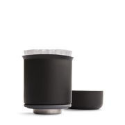 FELLOW | Stagg Pour-Over XF matte-black dripper with flat-bottom design and paper filter, showcasing stability and precision for optimal coffee brewing.