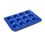 Great Jones | Stud Muffin - Blueberry pan with 12 nonstick, nontoxic cavities, ideal for muffins or cupcakes, ensures even heat distribution and easy cleanup.