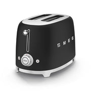 Smeg | 2 Slice Toaster - Black with chrome accents, features lever, STOP button, browning dial, and function buttons, ideal for versatile toasting.