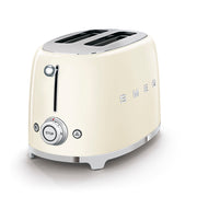 SMEG 2 Slice Toaster - Cream with retro design and chrome accents, featuring six toasting levels, defrost, reheat, bagel functions, and an easy-clean crumb tray.