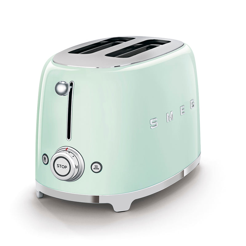 Smeg | Toaster - Pastel Green: Retro-style two-slice toaster with chrome controls, offering 6 toasting levels, defrost, reheat, and bagel functions, plus an easy-clean crumb tray.