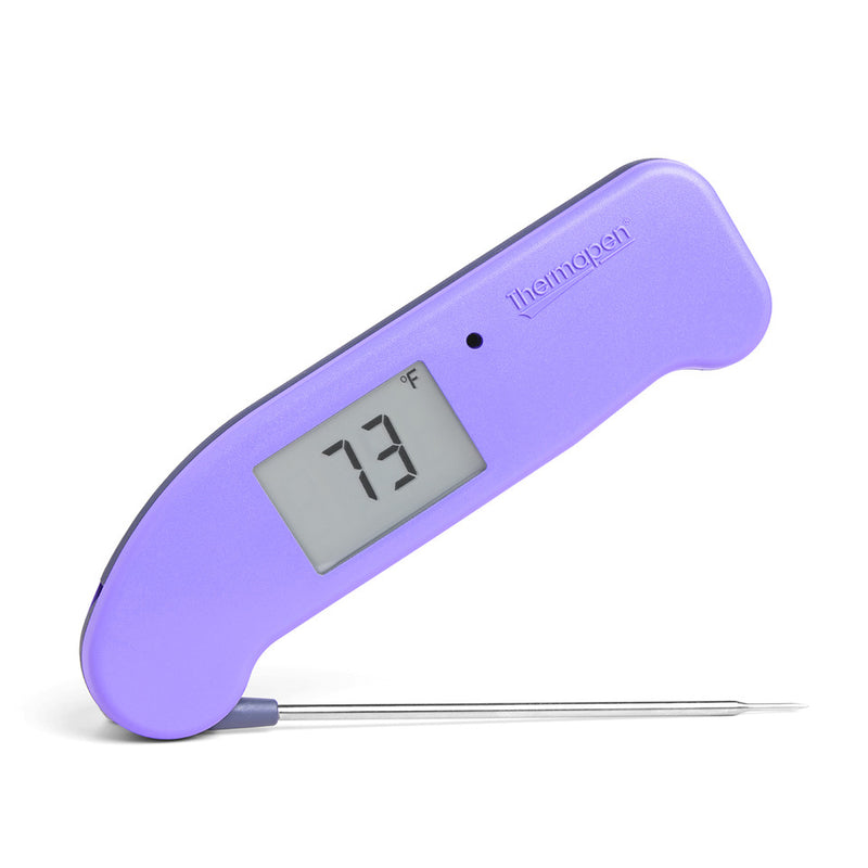 ThermoWorks Thermapen ONE - Purple with a redesigned battery compartment, auto-rotating display, motion-sensing mode, and waterproof case, perfect for precise, fast temperature readings.