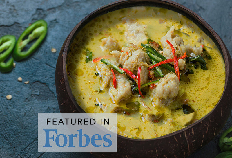 Thai for Two Green Curry Cooking Kit featuring organic ingredients, packaged in a reusable bag, promising an authentic Thai meal experience for two.