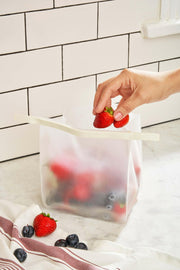Set of three W&P Roll Tight Storage Bags with bendable crimping bar, ideal for organizing freezer, fridge, and pantry. Includes 25 oz, 36 oz, and 50 oz bags.