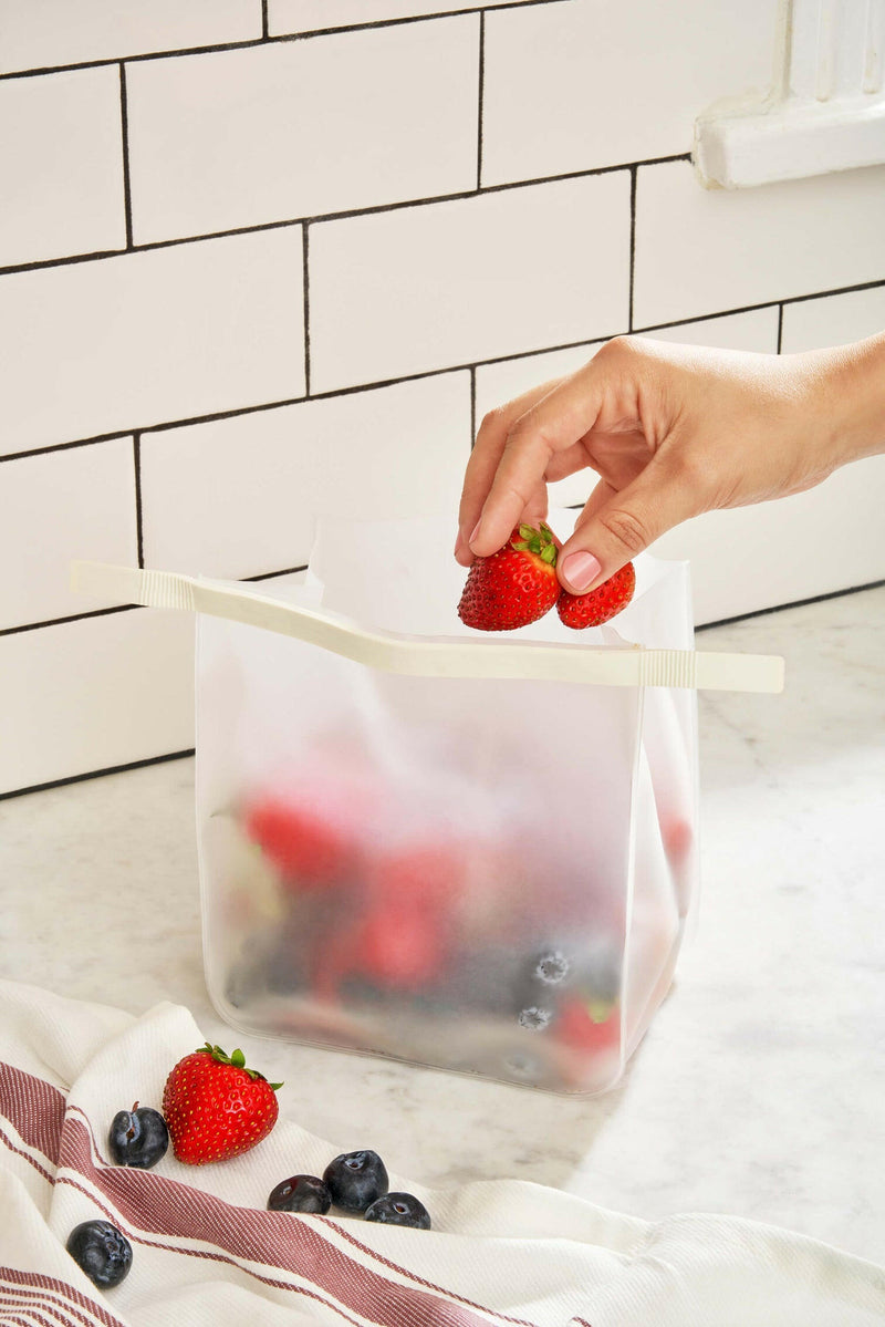 Set of three W&P Roll Tight Storage Bags with bendable crimping bar, ideal for organizing freezer, fridge, and pantry. Includes 25 oz, 36 oz, and 50 oz bags.