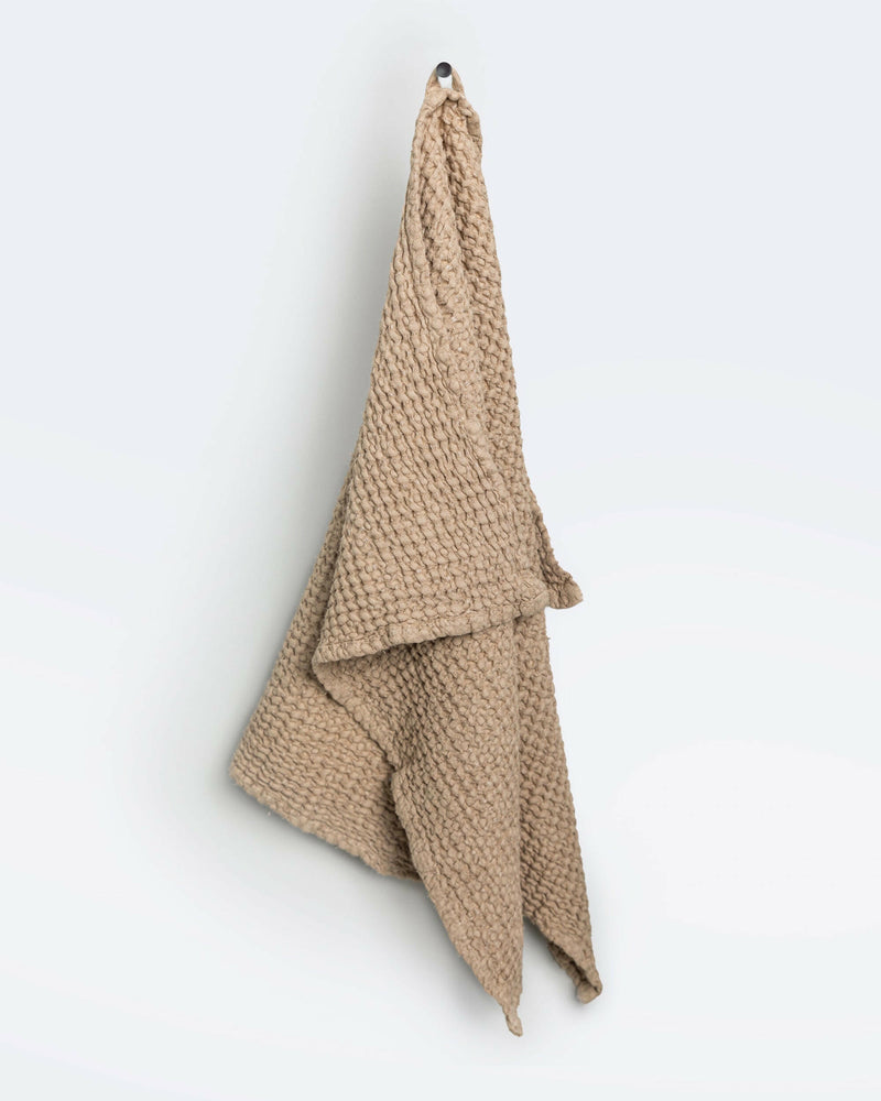 MagicLinen Waffle Kitchen Towels in Dusty Blue, large size, showcasing a durable linen-cotton blend with a unique waffle weave for enhanced absorbency and quicker drying.