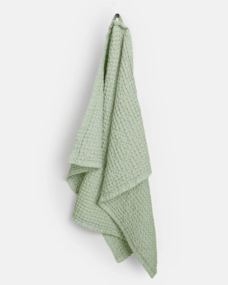 MagicLinen Waffle Kitchen Towels in Dusty Blue, featuring a waffle weave for enhanced absorbency, perfect for a modern kitchen setup.