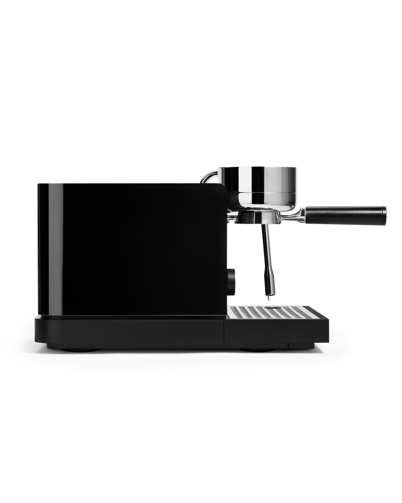 FELLOW | Espresso Series 1, Black: Compact espresso machine with stainless-steel portafilter and steam wand, designed for precise, professional-level performance at home.
