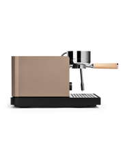 FELLOW | Espresso Series 1, a compact espresso machine featuring a matte-bronze housing, chrome brew head, wooden portafilter, and steaming wand for professional home use.
