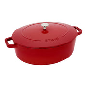 Staub Wide Oval Dutch Oven in Graphite Grey, showcasing its large size and unique oval shape, ideal for versatile cooking and even heat distribution.