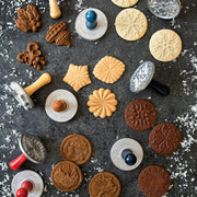 Nordic Ware | Snowflake Cookie Stamps - Set of 3 with cast aluminum stamps and wooden handles for creating embossed snowflake cookies, ideal for holiday baking.