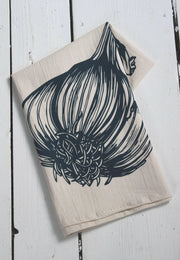 Hearth and Harrow | Organic Cotton Garlic Tea Towel, featuring a screen-printed garlic design, eco-friendly ink, and organic tag, perfect for stylish, sustainable kitchen use.