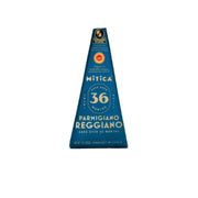 Nicola's Marketplace - Parmigiano Reggiano DOP Mitica® 36 months: 7 Ounces, triangular wedge in blue packaging, certified Italian cheese aged over 36 months.