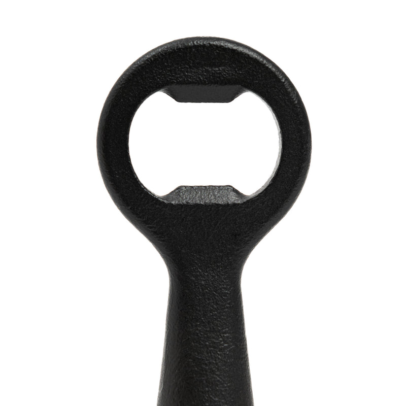 L'Atelier du Vin - USA - Bottle Opener - LE BRASSEUR – BLACK: Person-shaped stainless steel bottle opener with PVD skin and embossed synthetic leather disc, ideal for effortless bottle opening.