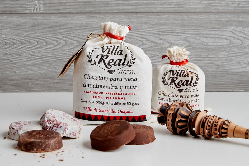 Verve Culture - Villa Real Mexican Hot Chocolate: Vanilla / Small - 5 Discs, featuring artisanal chocolate disks and a traditional molinillo for frothing, perfect for authentic Mexican hot chocolate.