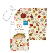 Bee's Wrap Sandwich Wrap - Meadow Magic featuring floral print, wooden button, and cotton tie; eco-friendly, vegan, reusable wrap shown with retail sleeve highlighting sustainability.