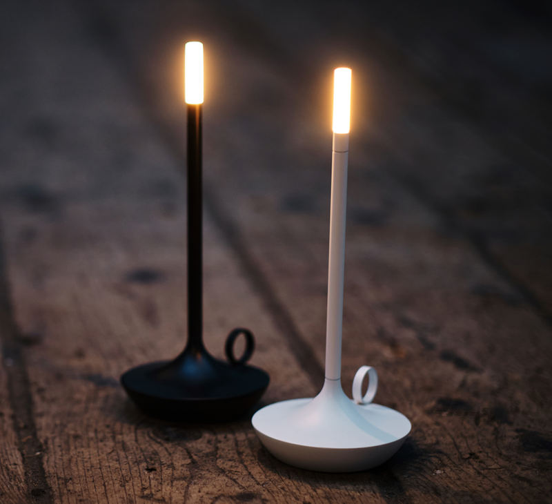 VANMOKUM | GRAYPANTS Wick Portable Rechargeable Lamp, black, on a wooden surface, showcasing its elegant design and utility for diverse settings.